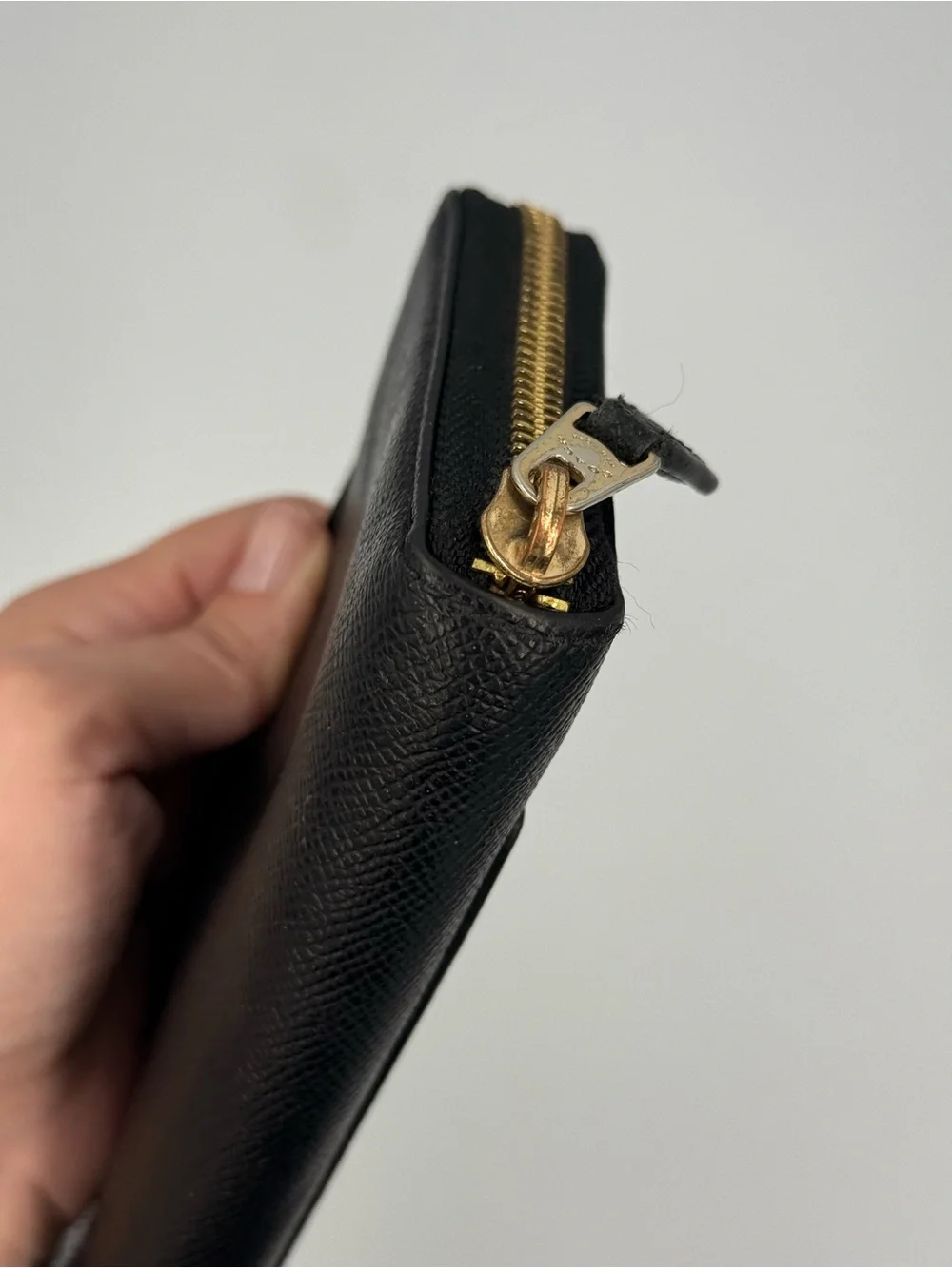 Coach Black Zip-Around Saffiano Leather Wallet with Gold Logo
